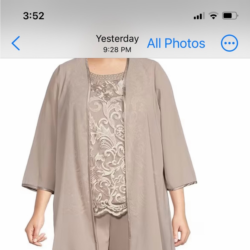 Brand New. Bought from Dillards.
